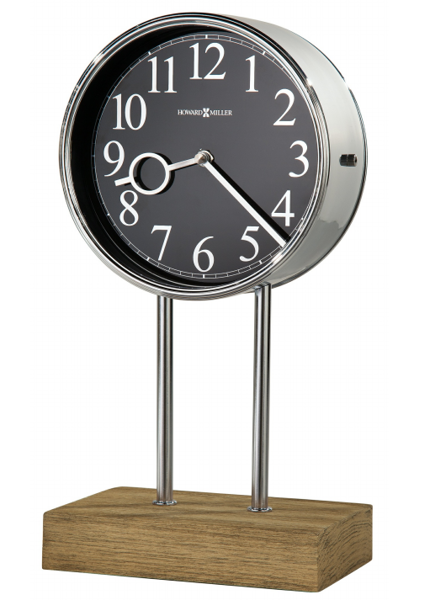 Picture of This mantel clock features a wide polished chrome bezel which is 7.25" in diameter, chrome posts, and chrome metal bottom base, and a Driftwood finished veneer wood base...The large, stationary black dial features chrome-finished Arabic numerals with c...